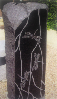 Monument with dragonflies